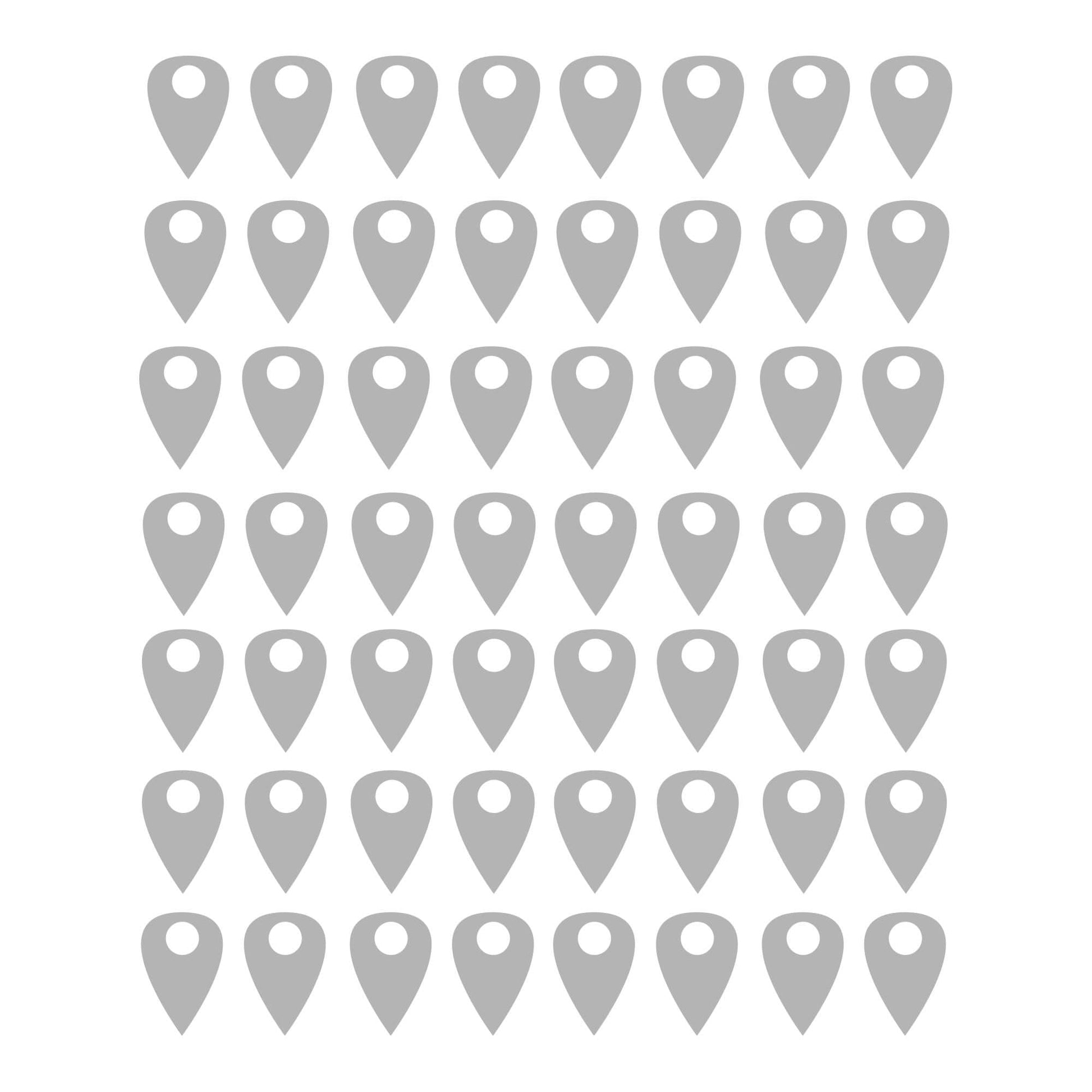 Silver pins on a white background.