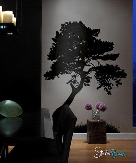 Tree Wall Decal with Grass. Modern Wall Decor. on a wall behind flowers