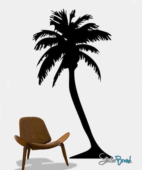 Black palm tree decals on a white background near a brown chair.