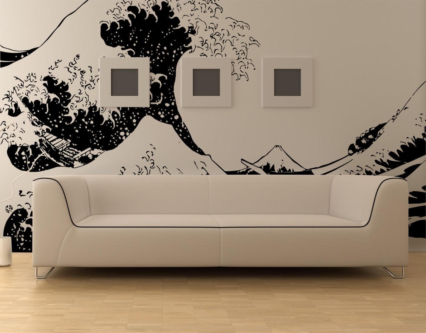 The Great Wave wall decal on a white wall in a living room.