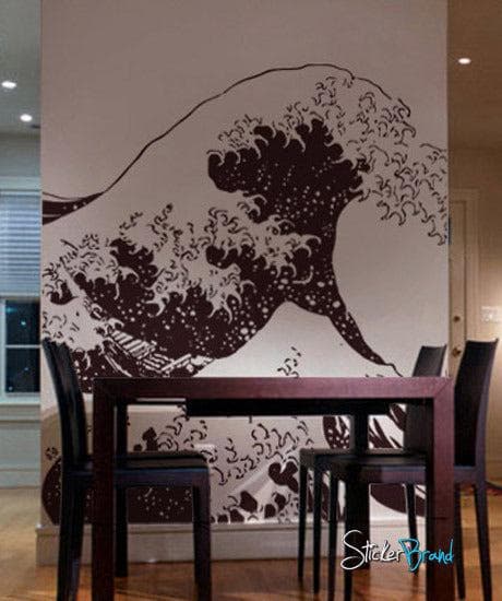 The Great Wave wall decal on a white wall in a dining room.