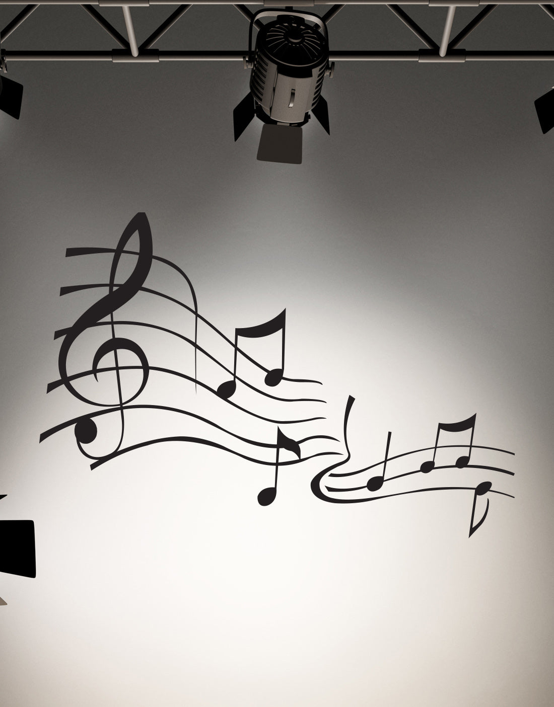 A black music note decal on a white wall.