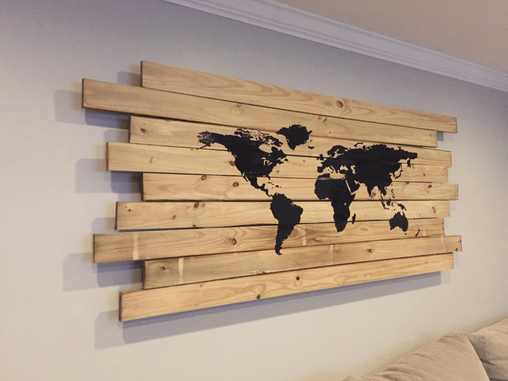 Black decal on a wooden wall in a living room.