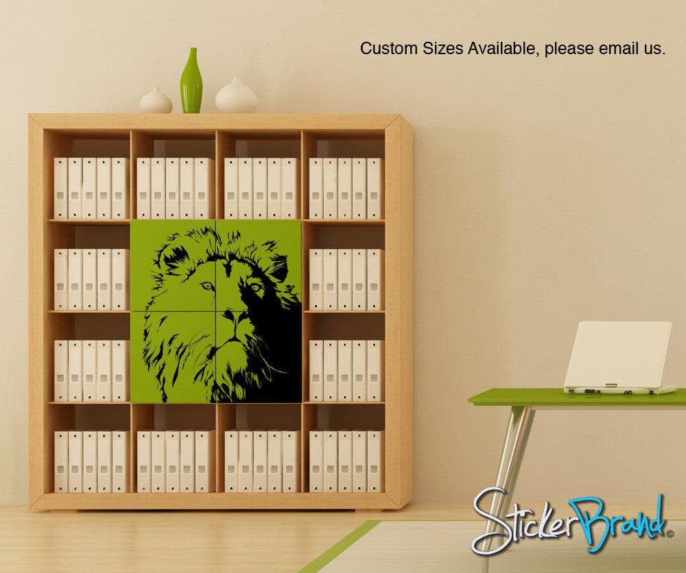 A black decal of a lion's face on a green cabinet near a green desk and white binders.