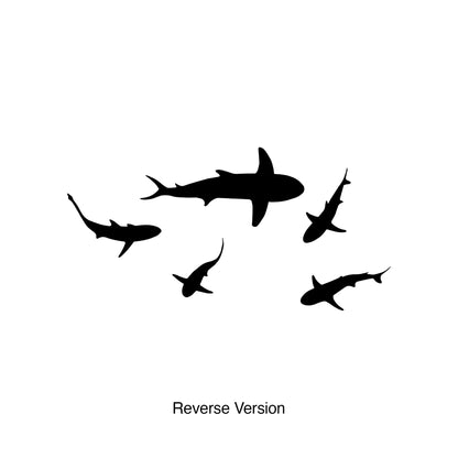 A black decal of a school of sharks on a white background. 