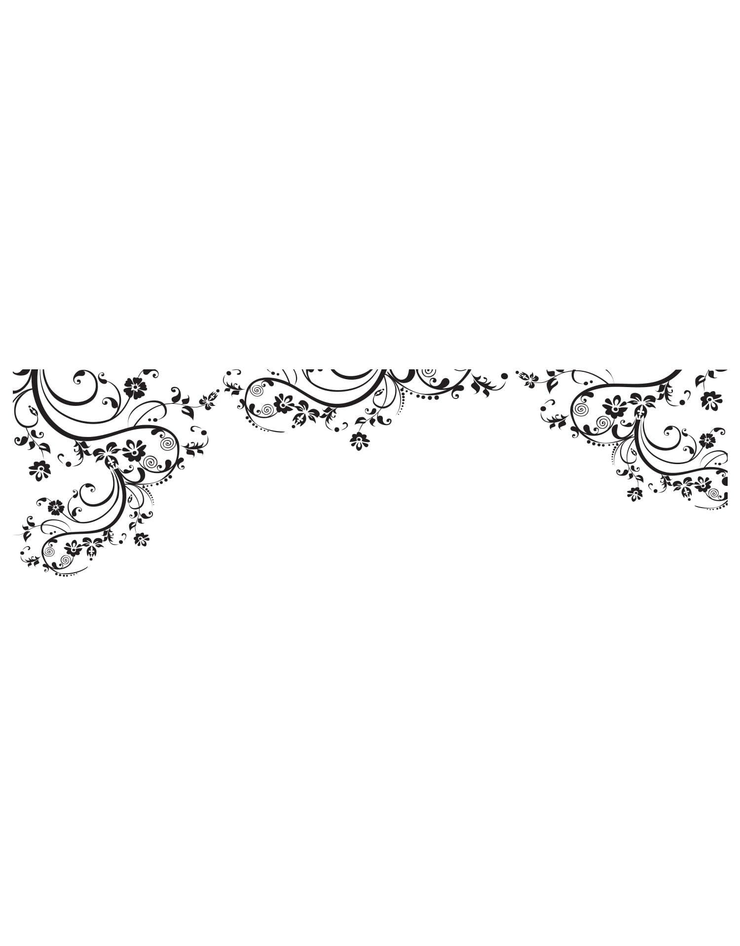 Black swirling floral decals on a white wall.