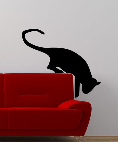 Playful Cat Jumping Down Wall Decal. #5491