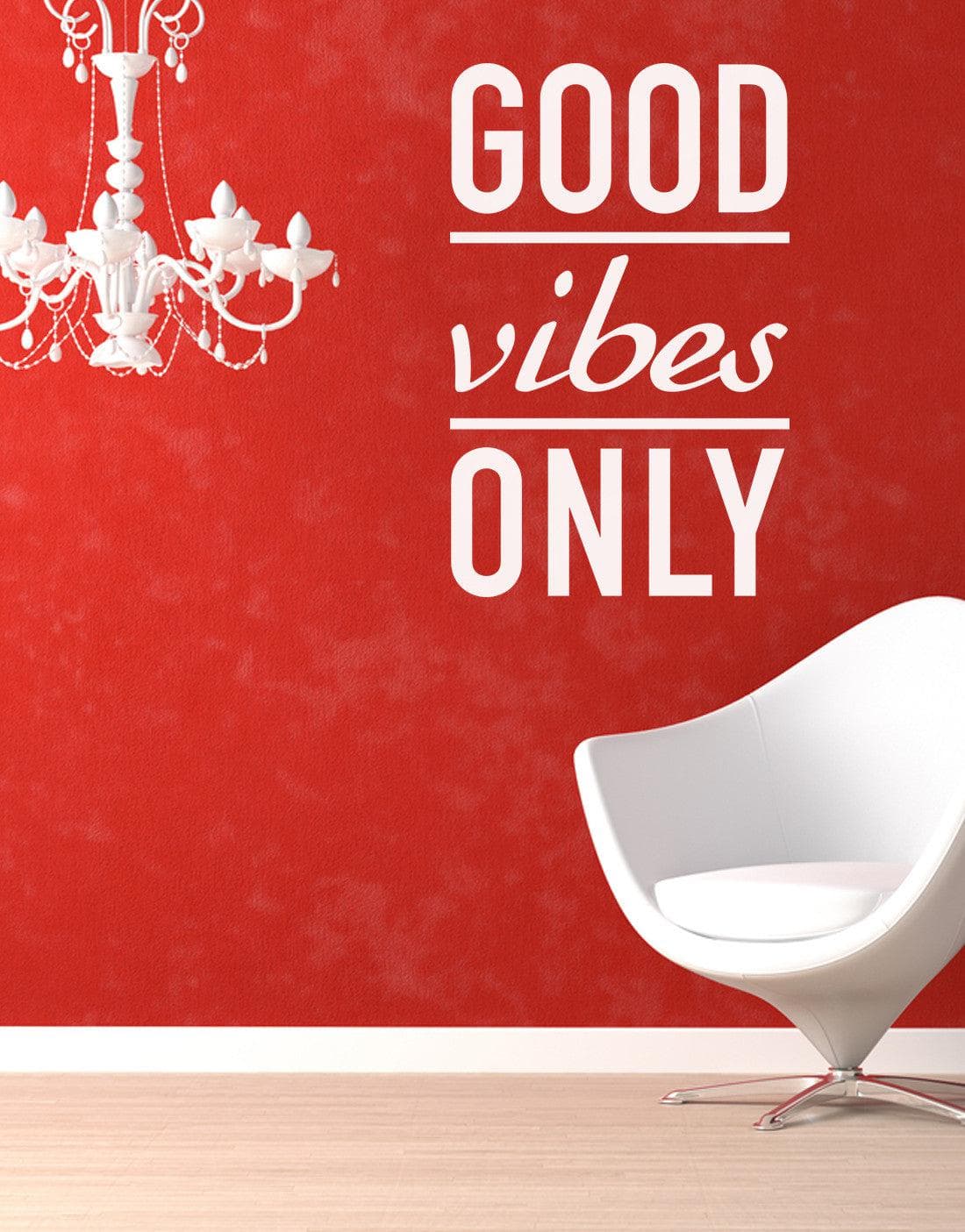 Good Vibes Only Motivational Vinyl Wall Decal on a red wall.